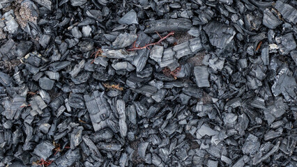 Black charcoal texture from burnt wood.