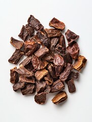 Fototapeta premium Overhead View of Dried Chipotle Peppers on White Background