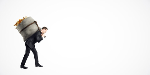 Businessman carrying large sack filled with gold coins on his back, symbolizing financial burden....