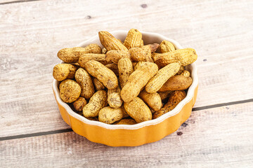 Raw ripe unpeeled peanut heap