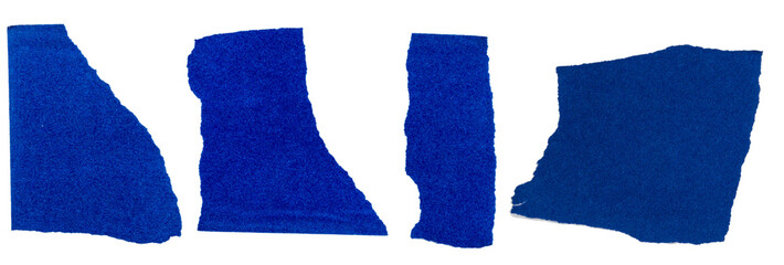 Isolated set of torn blue pieces of matte paper on white background