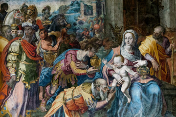 Fresco (15th century) of Christmas Nativity Scene : Adoration of the Magi as they present gifts of gold, frankincense and myrrh to the Infant Jesus. ...