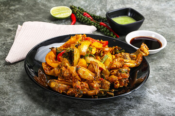 Vietnamese cuisine - fried frog with vegetables