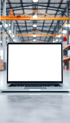 Fototapeta premium Laptop with blank screen frameless in new warehouse or production, manufacturing hall isolated with white highlights, png