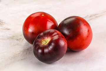 Black ripe juicy organic tomato