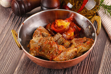 Baked lamb ribs with vegetables