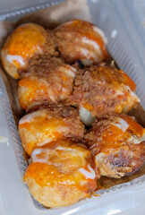 Indonesian street food snack takoyaki.