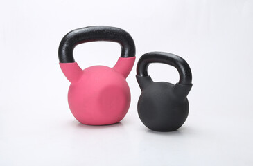 colorful kettlebell weights isolated on light background