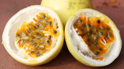 Fresh Passion Fruit  Halves Showing Seeds and Vibrant Pulp – High-Quality Close-Up Image