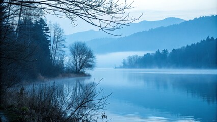 - Soft focus landscape with blue misty atmosphere, bokeh, horizon, calm, illusion, hazy