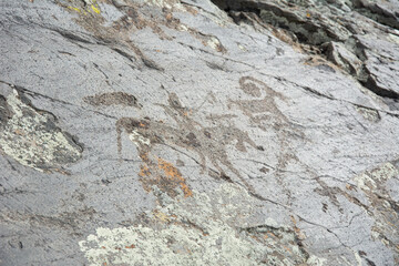 Central asian one of the most amazing rock carving petroglyphs in Altai mouintains, Western Mongolia