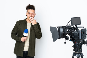 Reporter man holding a microphone and reporting news with surprise facial expression
