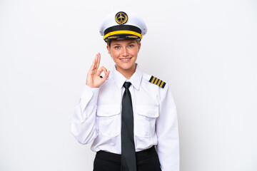 Airplane caucasian pilot woman isolated on white background showing ok sign with fingers