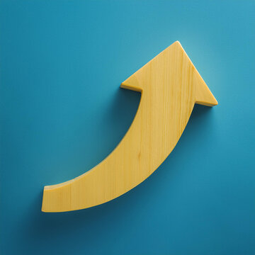 Yellow wooden arrow on blue background. Business and market growth concept.