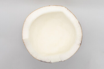 peeled coconut isolated on white background