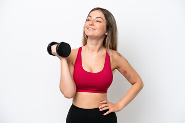 Young sport Rumanian woman making weightlifting isolated on white background posing with arms at hip and smiling