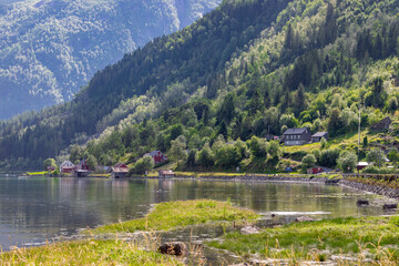 Fototapeta premium Fjærlandsfjorden is a fjord in Vestland county, Norway. It is an arm of the fjord that branches off from the main Sognefjorden to the north, passing through the municipality of Sogndal.