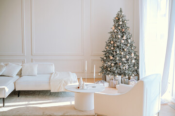 Cozy winter living room with a beautifully decorated Christmas tree