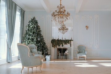 Cozy holiday living room with a decorated Christmas tree and elegant furniture