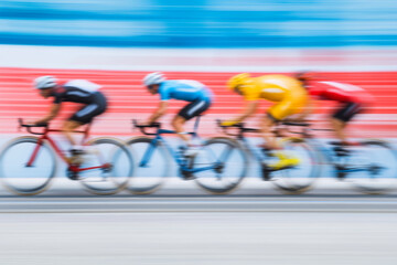 Competitors racing on a cycling track during an intense competition in vibrant colors and dynamic motion capture