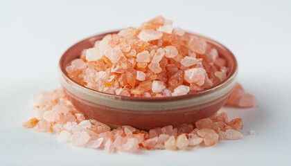 Bowl of crystals Himalayan salt. Natural mineral. Isolated on white backdrop. Close-up.