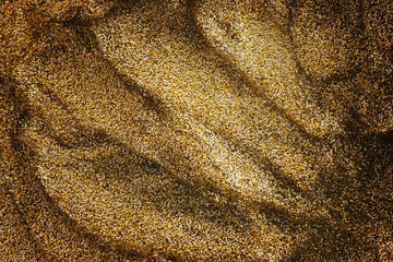 abstract glitter gold lights background. de-focused