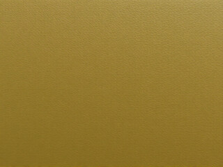 Fototapeta premium Textured golden background with a subtle pattern ideal for design projects and creative displays