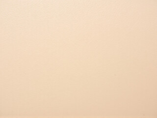 Soft beige surface texture with subtle variations in color and tone, creating a warm and inviting backdrop for design projects