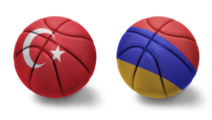 basketball balls with the national flags of armenia and turkey on the white background.