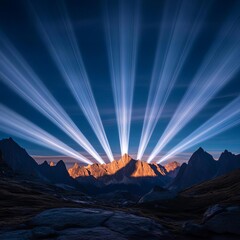 Naklejka premium Dramatic mountain landscape at night illuminated by artificial beams of light, surreal and mystical atmosphere