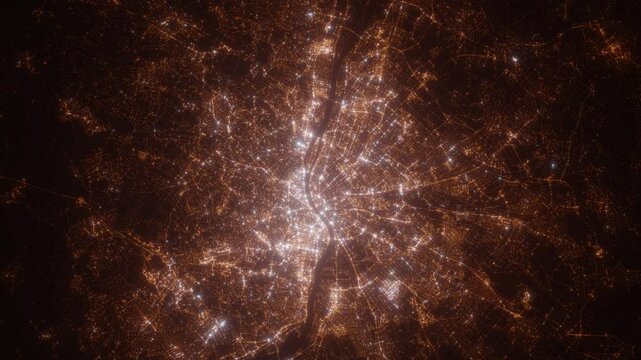 Budapest (Hungary) aerial view at night. Top view on modern city with street lights. Camera is flying above the city, moving backward