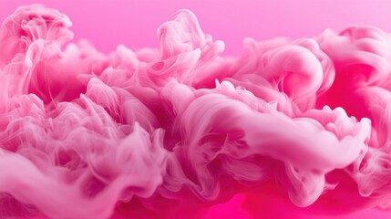 Fototapeta premium Soft pink wisps of smoke creating an ethereal atmosphere in a dreamy setting.