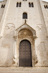 Fototapeta premium Entrance door of The Basilica of Saint Nicholas ( San Nicola ) in Bari, Roman Catholic Church in region of Apulia