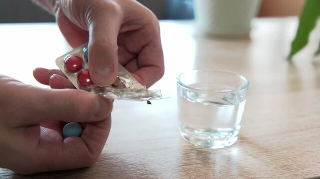 A person effectively taking their prescribed medication alongside water for better results