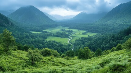 Fototapeta premium Breathtaking valley landscape with mountains and lush greenery under cloudy sky
