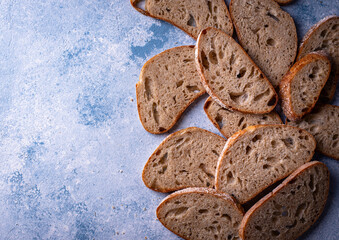 Sliced bread on blue backgrouns