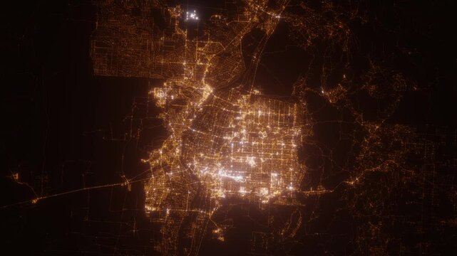 Albuquerque (New Mexico, USA) aerial view at night. Top view on city from space. Camera is zooming in, rotating clockwise