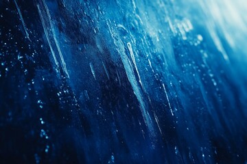 Fototapeta premium The image is a blue and white background with a lot of water droplets