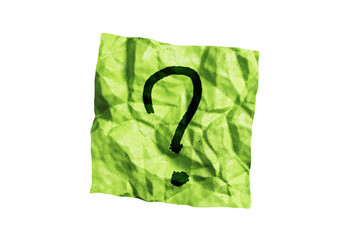 A crumpled green paper with a black question mark in the center, isolated on a white background,...