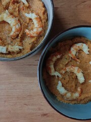 Keto breakfast - pumpkin porridge with vegetables and shrimp 