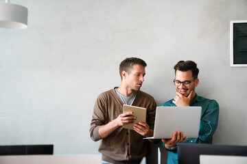 Programmers working in a software developing company office