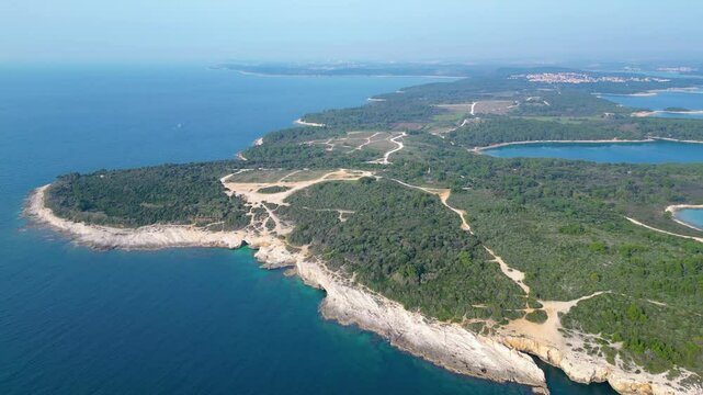 Rt Kamenjak is a stunning peninsula located near Pula, Croatia. Renowned for its rugged coastline, crystal-clear waters, and numerous small islands, it offers breathtaking aerial views