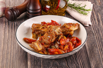 Baked lamb ribs with vegetables