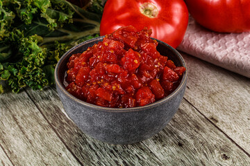 Diced ripe tomato with sauce