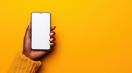 Hand Holding Smartphone with Empty Screen over Bright Yellow Background, Perfect for Technology, Communication or Social Media Themes