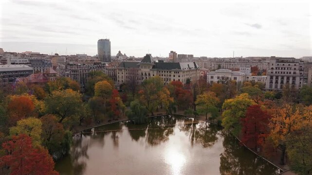 Cismigiu Park. Aerial 4k video of this historical park and gardens Cismigiu from Bucharest during an autumn day. Travel to Romania.