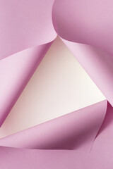 Vintage pink design made with twisted pink paper. Minimal background concept for creative product display.