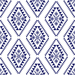 Fototapeta premium Navajo pattern design. Native American style. Can be used in fabric design for clothing, textile, wrapping, background, wallpaper, carpet, embroidery