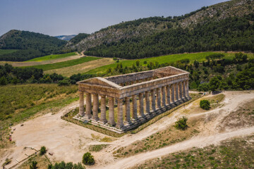 Ruins of Greek temple in ancient city of Segesta, Sicily, Italy. June 2023. Aerial drone picture.