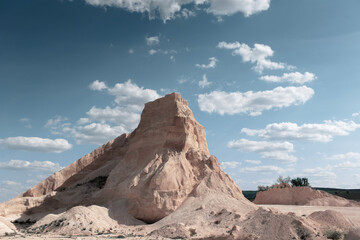 View of canyon hill on background of blue sky.